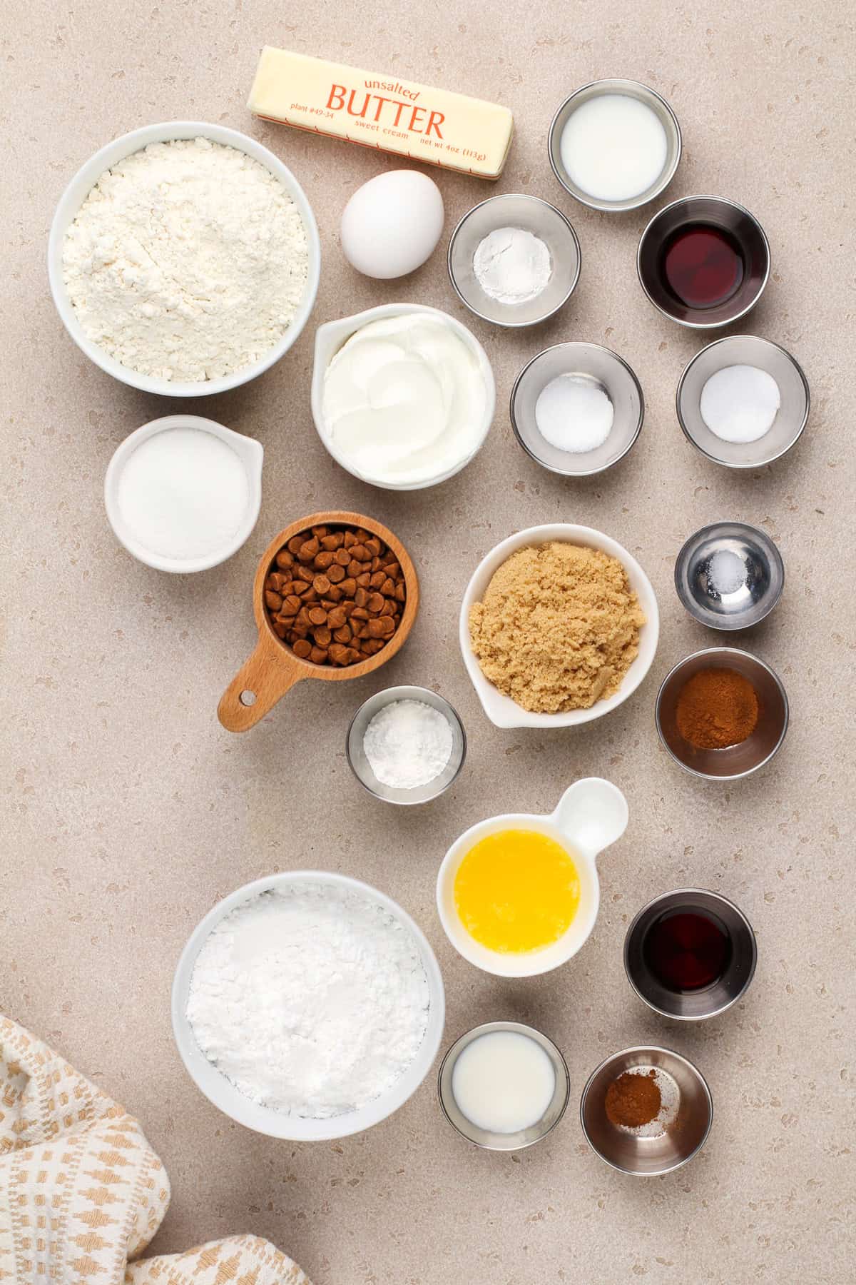 Ingredients for cinnamon scones arranged on a countertop.