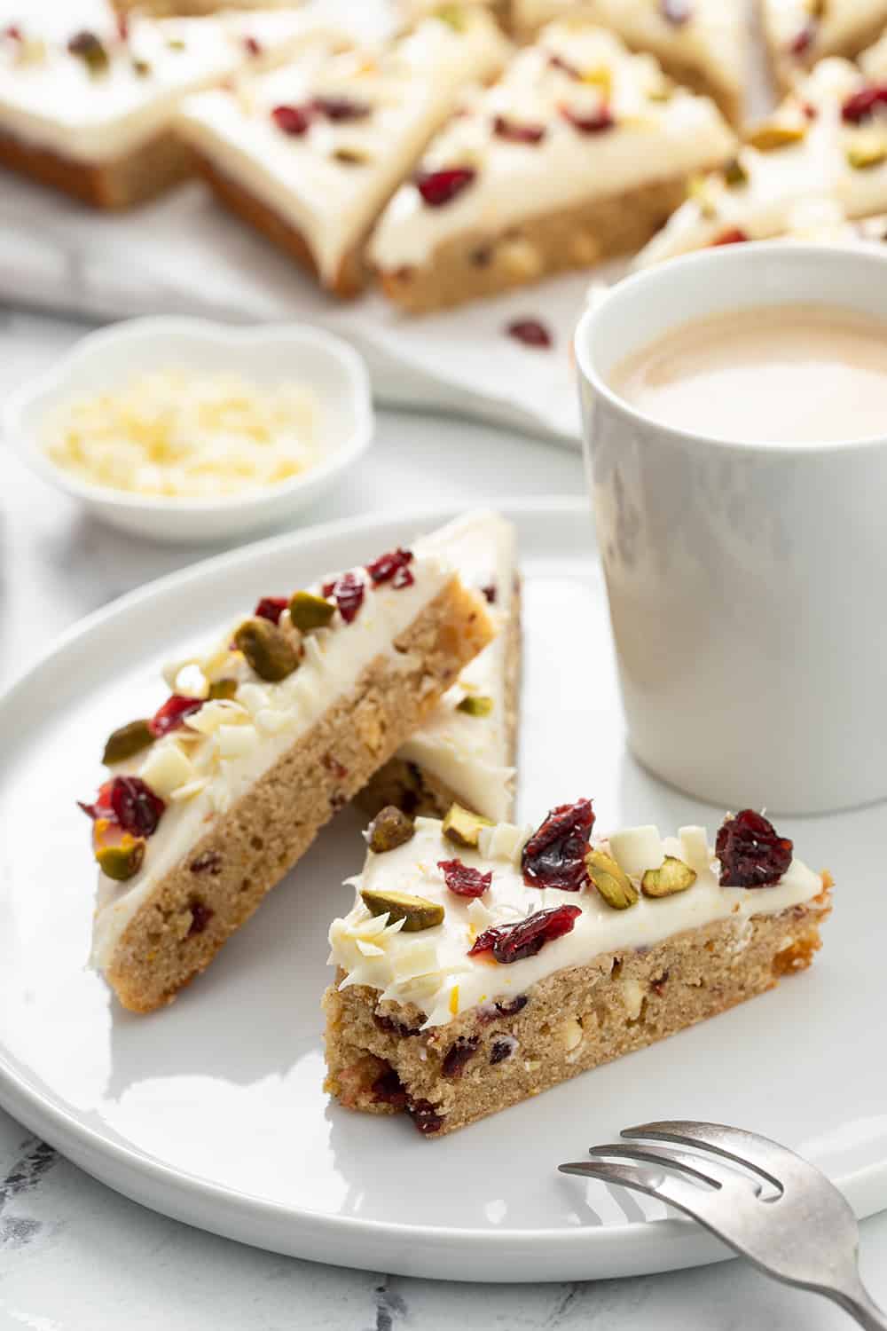 https://www.mybakingaddiction.com/wp-content/uploads/2010/12/plate-of-cranberry-bliss-bars.jpg