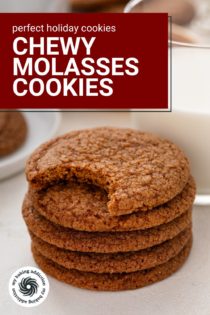 Five molasses cookies stacked next to a glass of milk. The top cookie has a bite taken out of it. Text overlay includes recipe name.