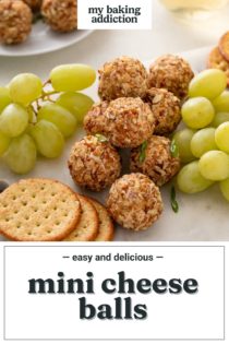 Mini cheese balls next to grapes and crackers on a marble board. Text overlay includes recipe name.