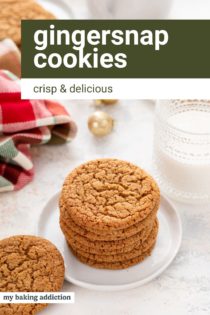 White plates holding gingersnap cookies around a glass of milk. Text overlay includes recipe name.