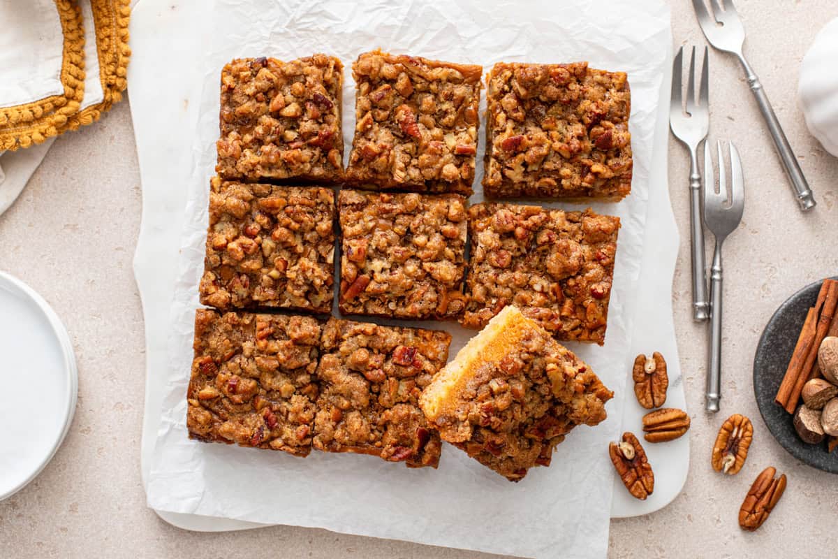 Overhead view of sliced pumpkin pecan pie bars.