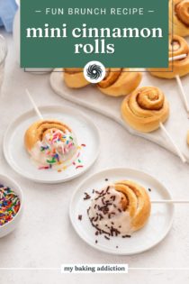 Two white plates, each holding a mini cinnamon roll on a lollipop stick dipped in glaze and topped with sprinkles. Text overlay includes recipe name.