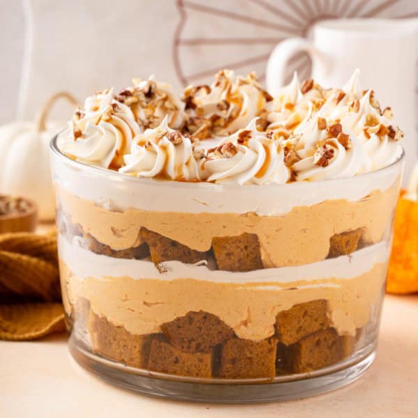 Garnished pumpkin trifle in a trifle dish.