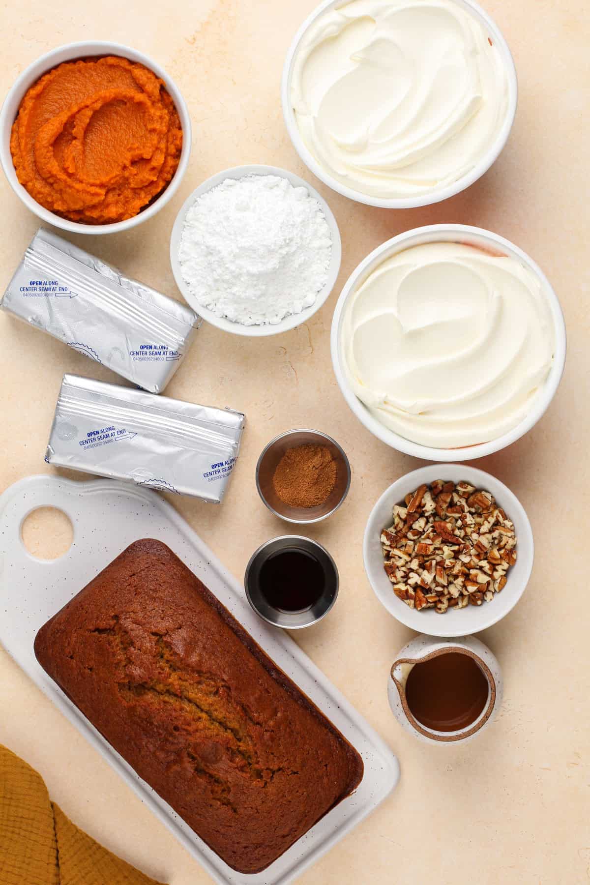 Ingredients for pumpkin trifle arranged on a countertop.