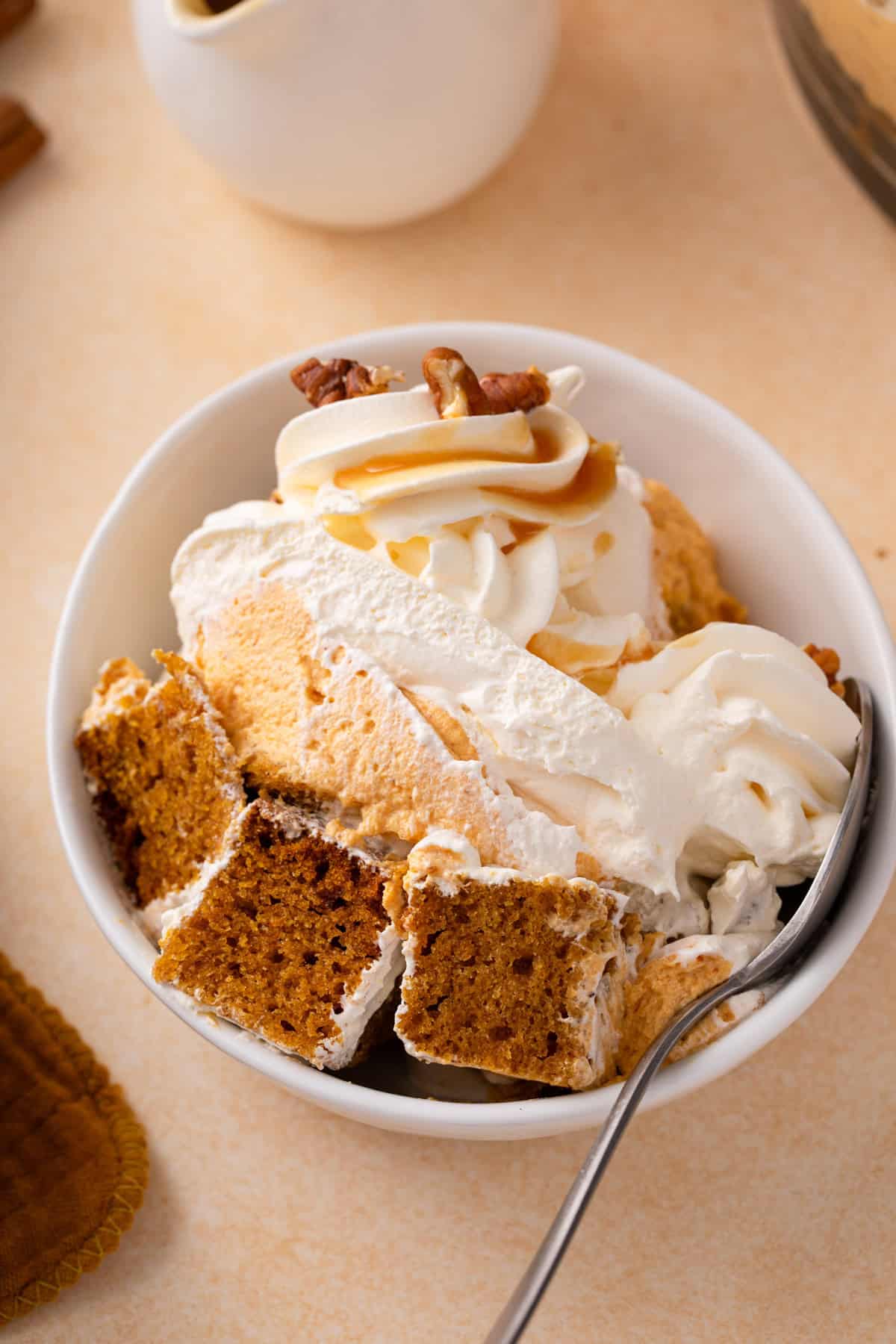 Serving of pumpkin trifle in a white bowl.