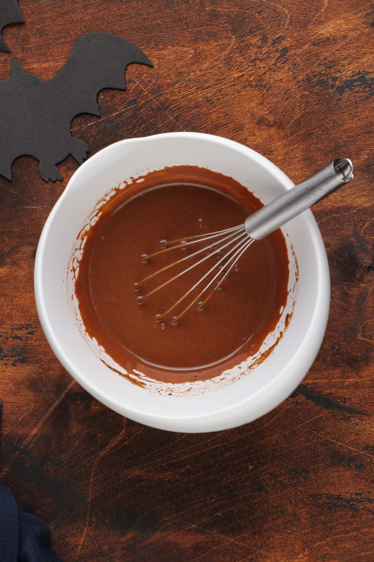 Chocolate pudding whisked together in a mixing bowl.