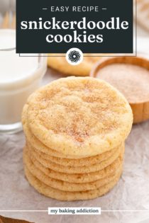 Seven snickerdoodle cookies stacked next to a glass of milk. Text overlay includes recipe name.