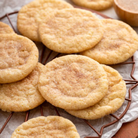 Easy snickerdoodle cookies on a wire rack.