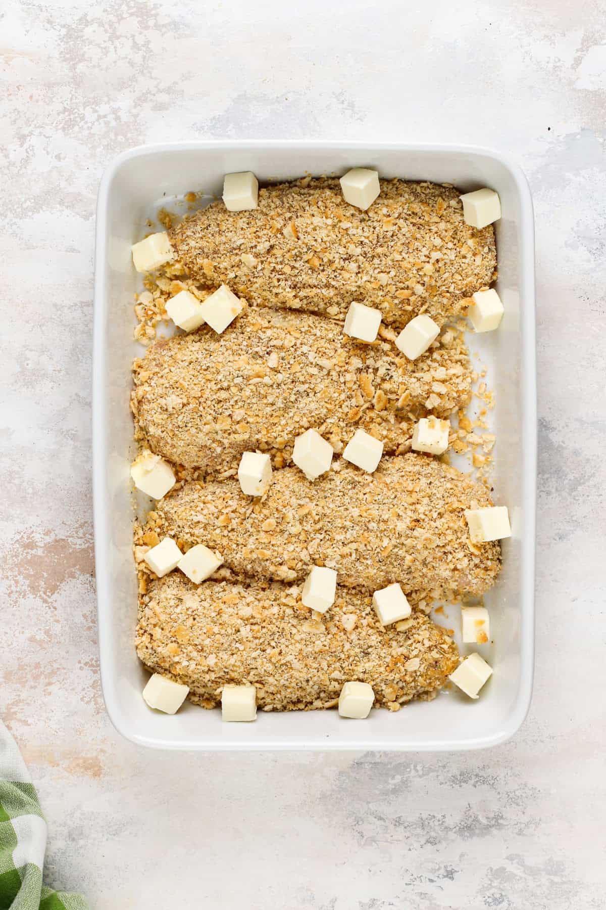 Assembled ritz cracker chicken ready to go in the oven.