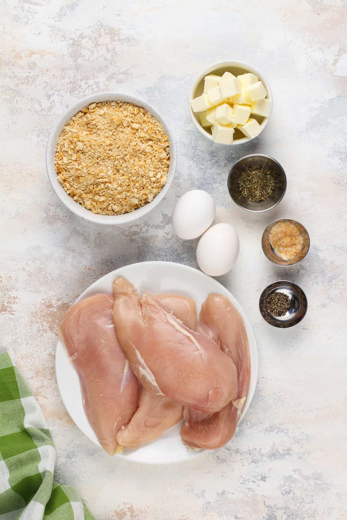 Ingredients for ritz cracker chicken arranged on a countertop.