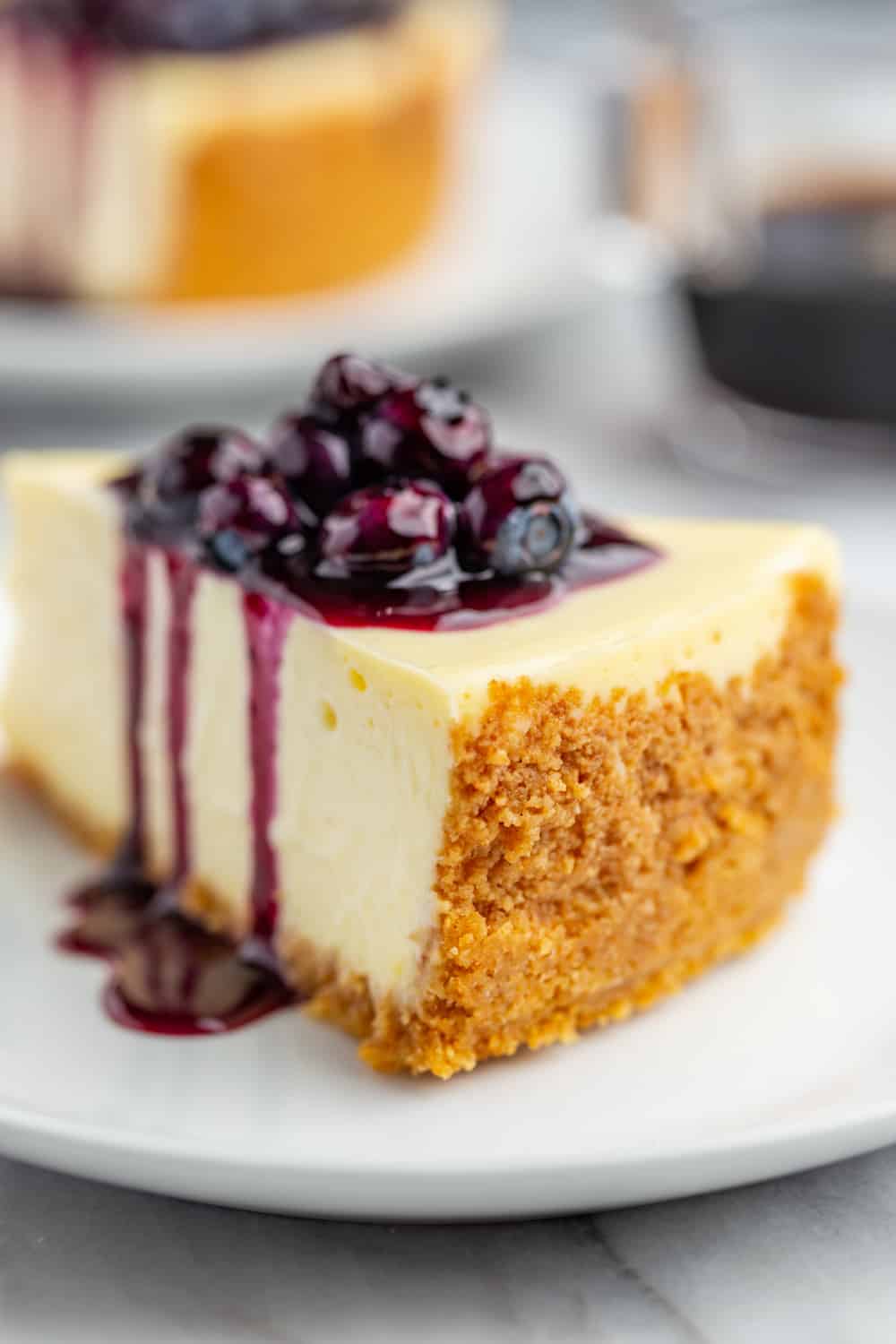 https://www.mybakingaddiction.com/wp-content/uploads/2019/07/Cheesecake-with-Blueberry-Sauce-54-of-61_resized.jpg