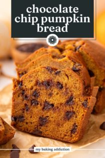 Close up of slices of chocolate chip pumpkin bread leaning against the rest of the loaf. Text overlay includes recipe name.