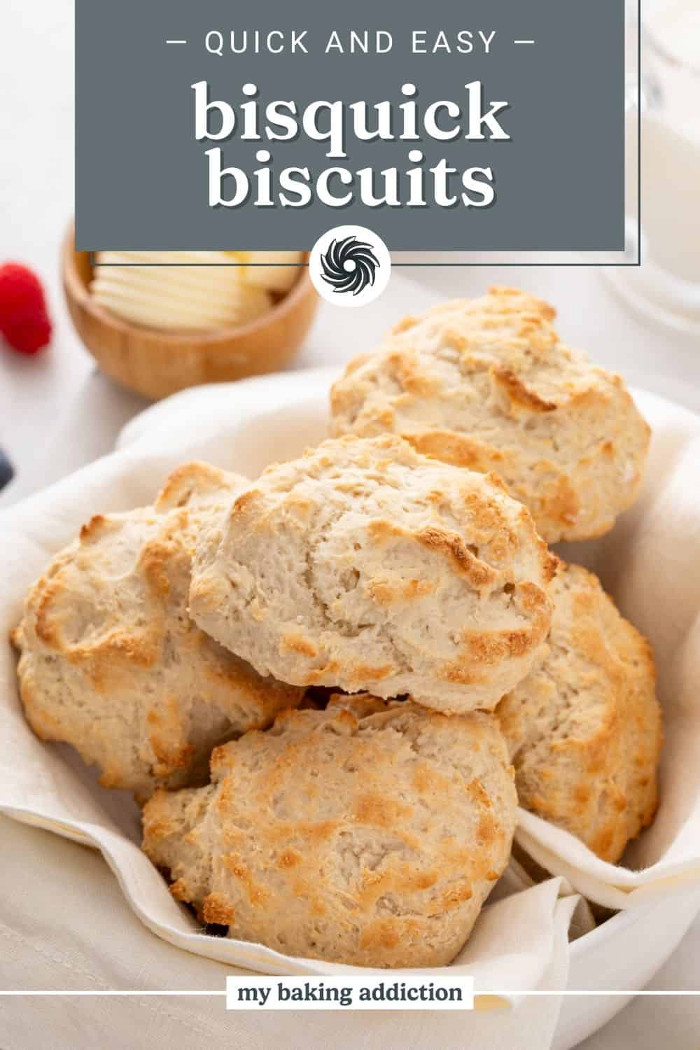 Bisquick biscuits in a bread basket. The text overlay includes the recipe name.