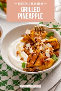 Honey being drizzled over grilled pineapple on yogurt, garnished with coconut. Text overlay includes recipe name.