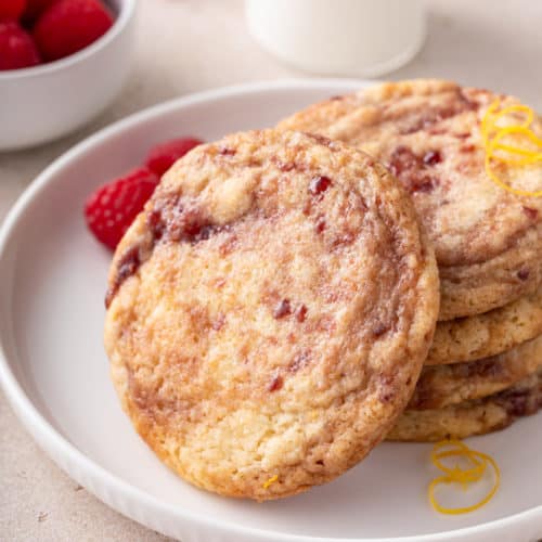 https://www.mybakingaddiction.com/wp-content/uploads/2023/08/stacked-raspberry-lemon-cookies-hero-500x500.jpg