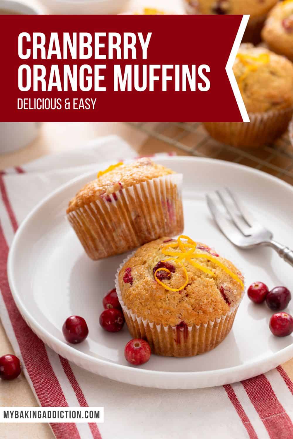 Two cranberry orange muffins on a white plate.  The text overlay includes the recipe name.