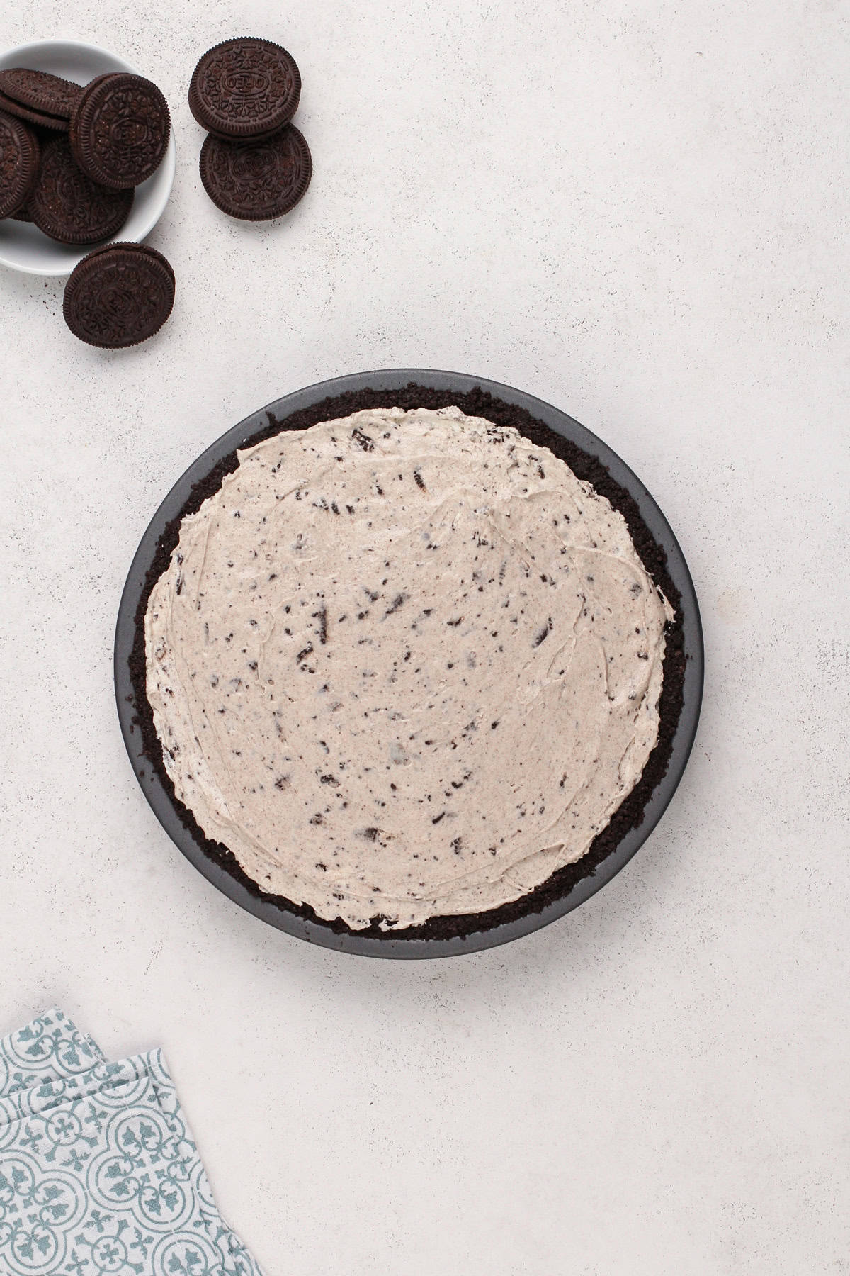 Assembled oreo pie ready to be chilled.