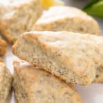 Close up of glazed lemon poppy seed scones.