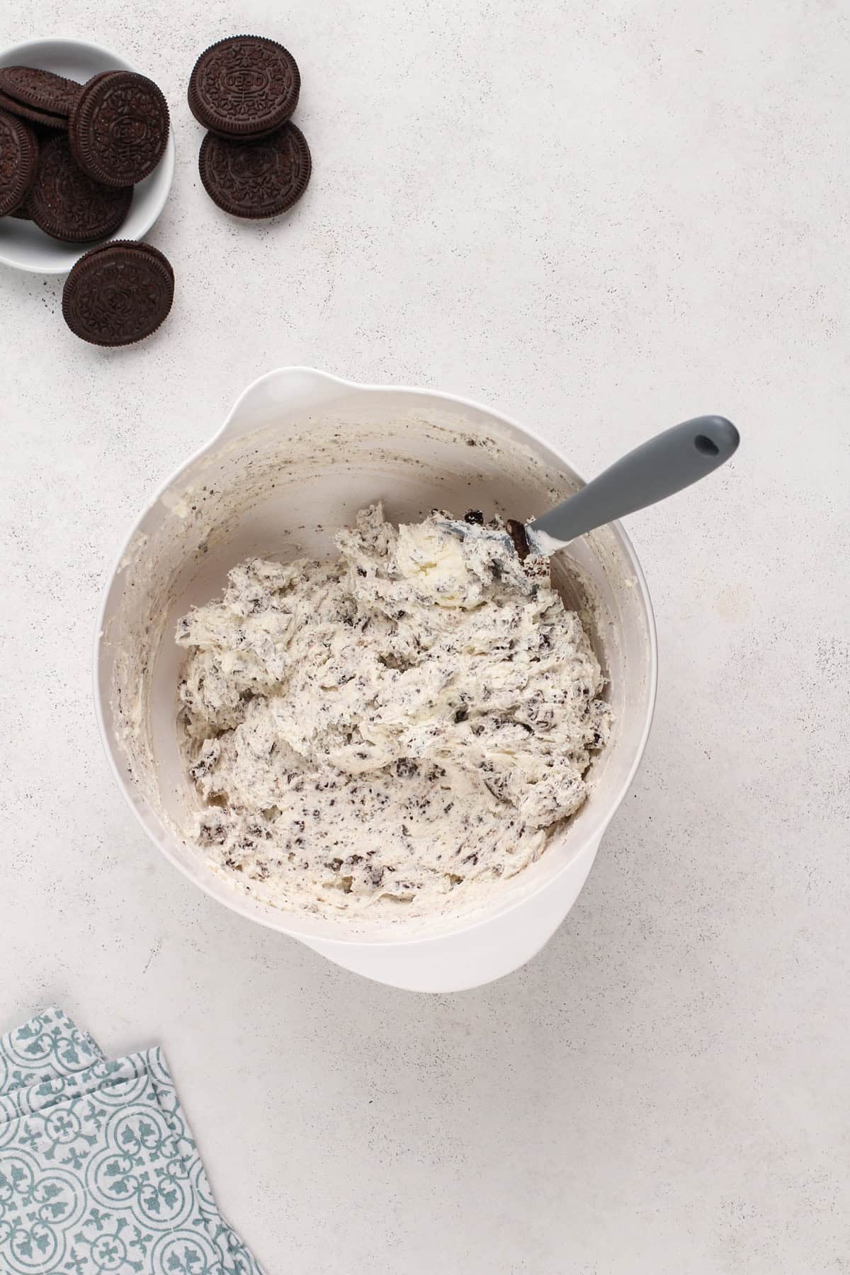 Oreo pie filling in a white bowl.