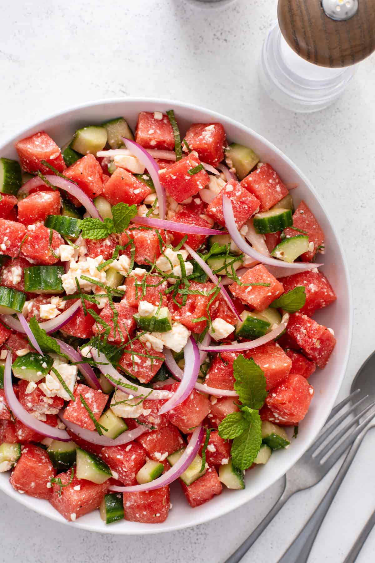 Overhead view of watermelon feta salad in a bowl.