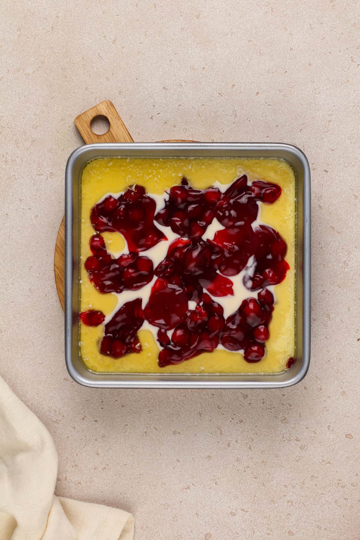 Unbaked easy cherry cobbler ready to go in the oven.