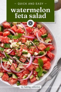 Overhead view of watermelon feta salad in a bowl. Text overlay includes recipe name.