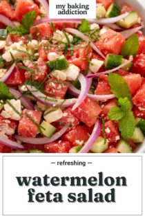Close up of watermelon feta salad in a white bowl. Text overlay includes recipe name.