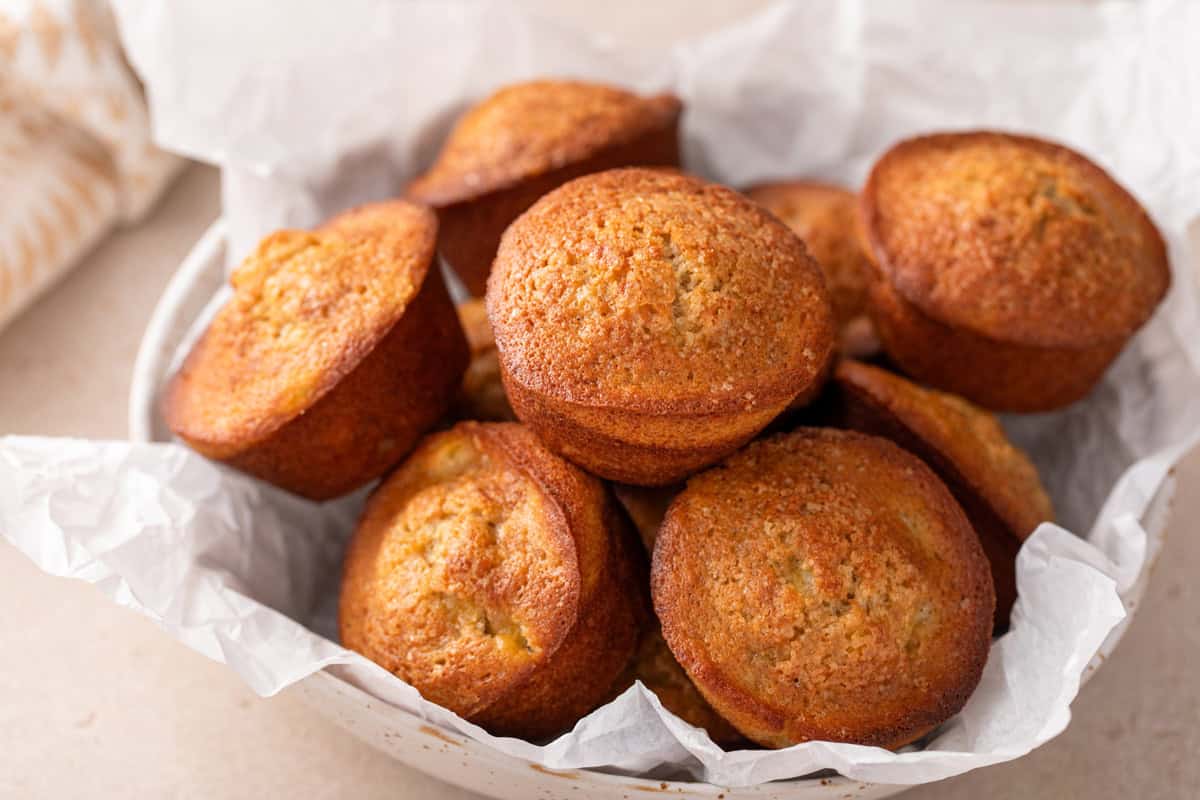 Bowl filled with banana bread muffins.