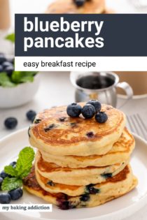 Stack of blueberry pancakes on a white plate. Text overlay includes recipe name.