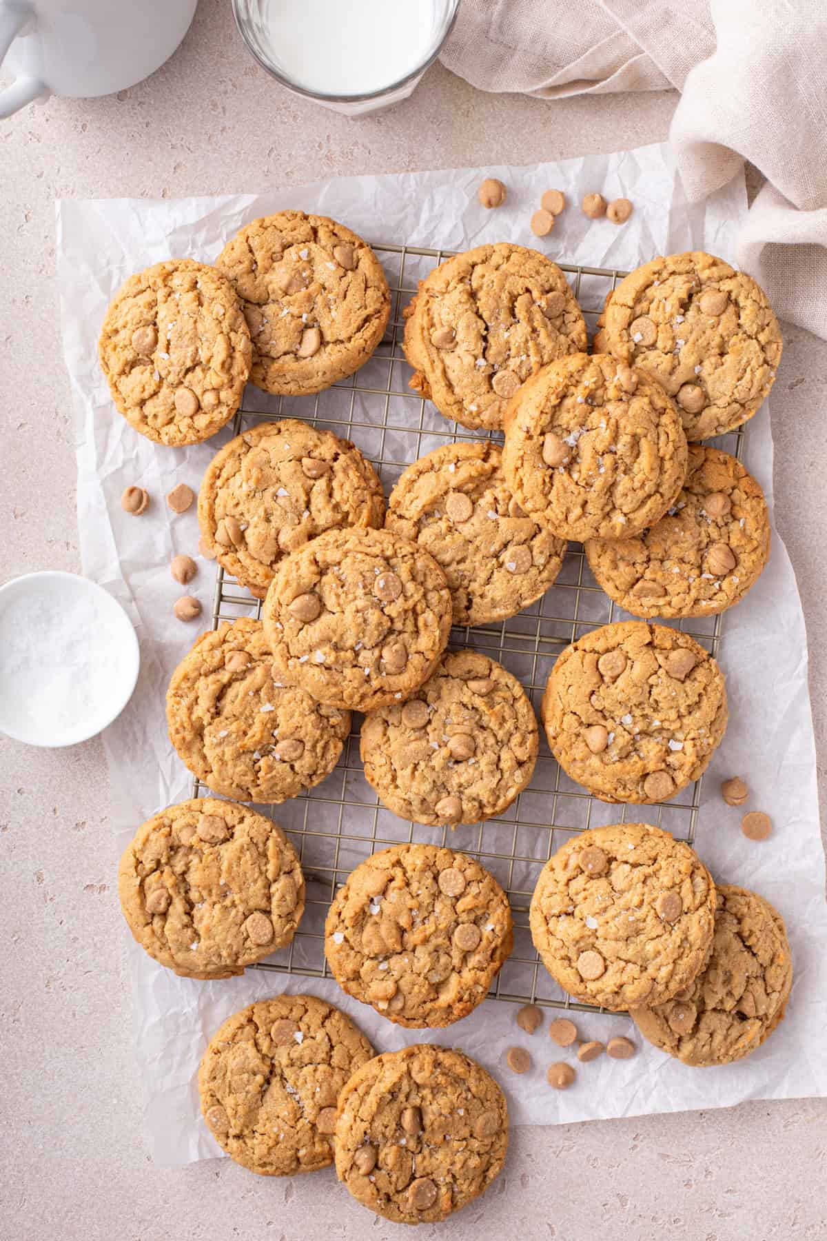 Overhead photo of peanut butter oatmeal cookies cooling on a wire rack.