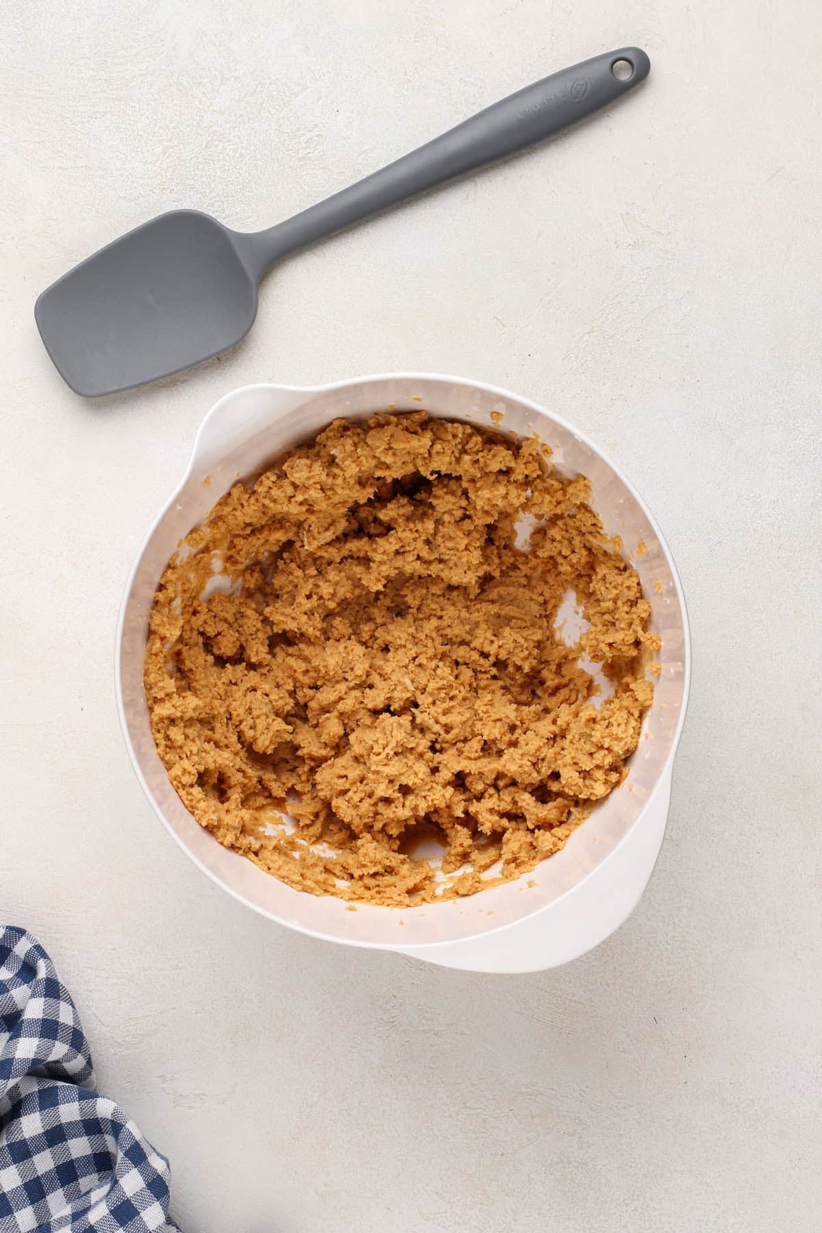 Cream cheese and peanut butter mixed in a bowl.