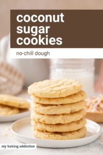 Six coconut sugar cookies stacked on a white plate. Text overlay includes recipe name.