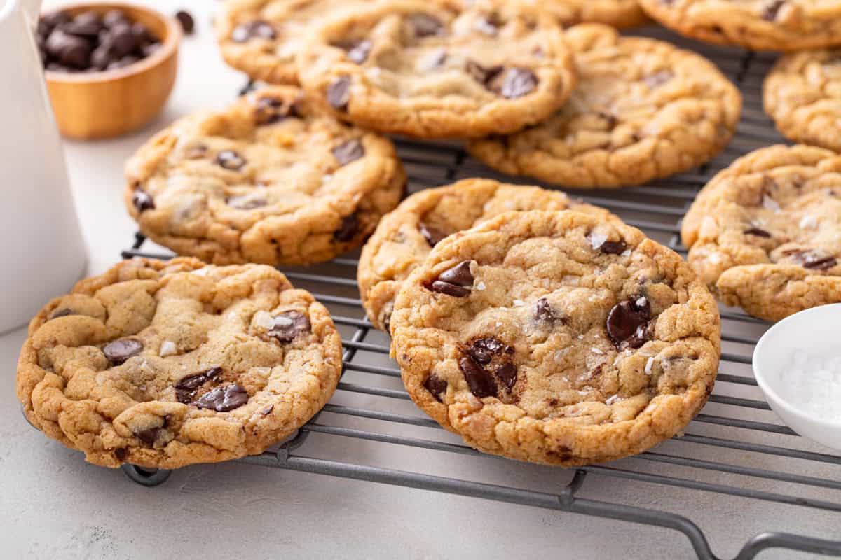 Heath bar cookies cooling on a wire rack.