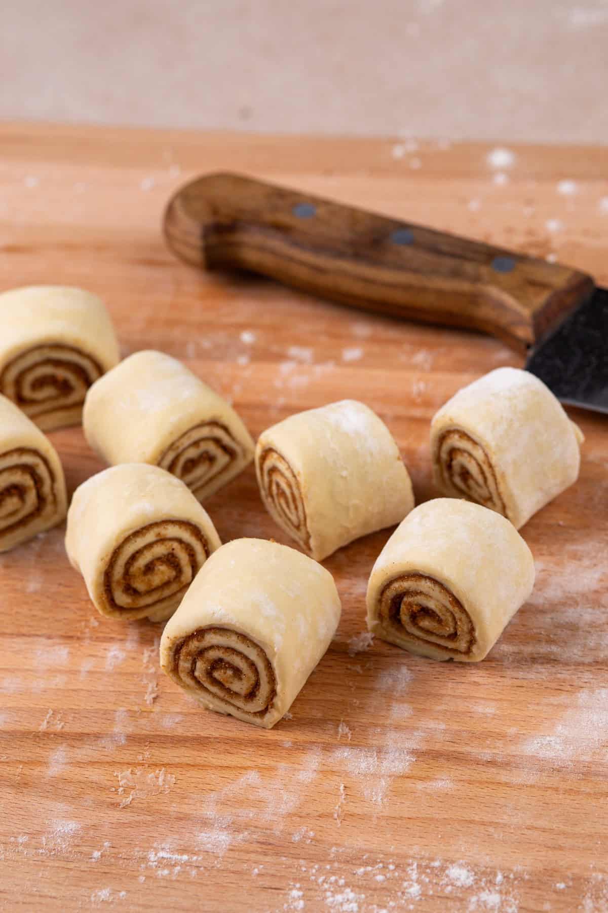 Sliced pieces of puff pastry cinnamon rolls.