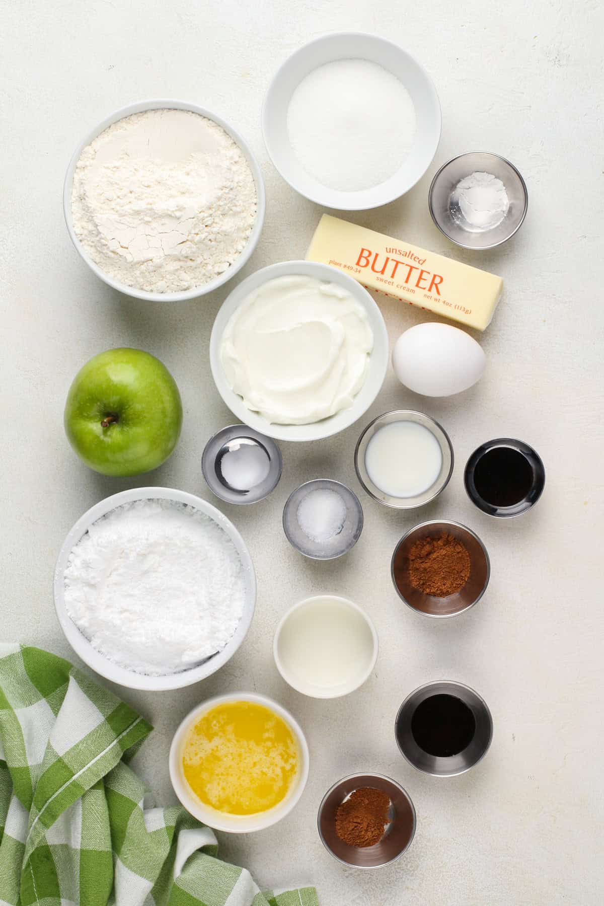 Ingredients for apple scones arranged on a countertop.