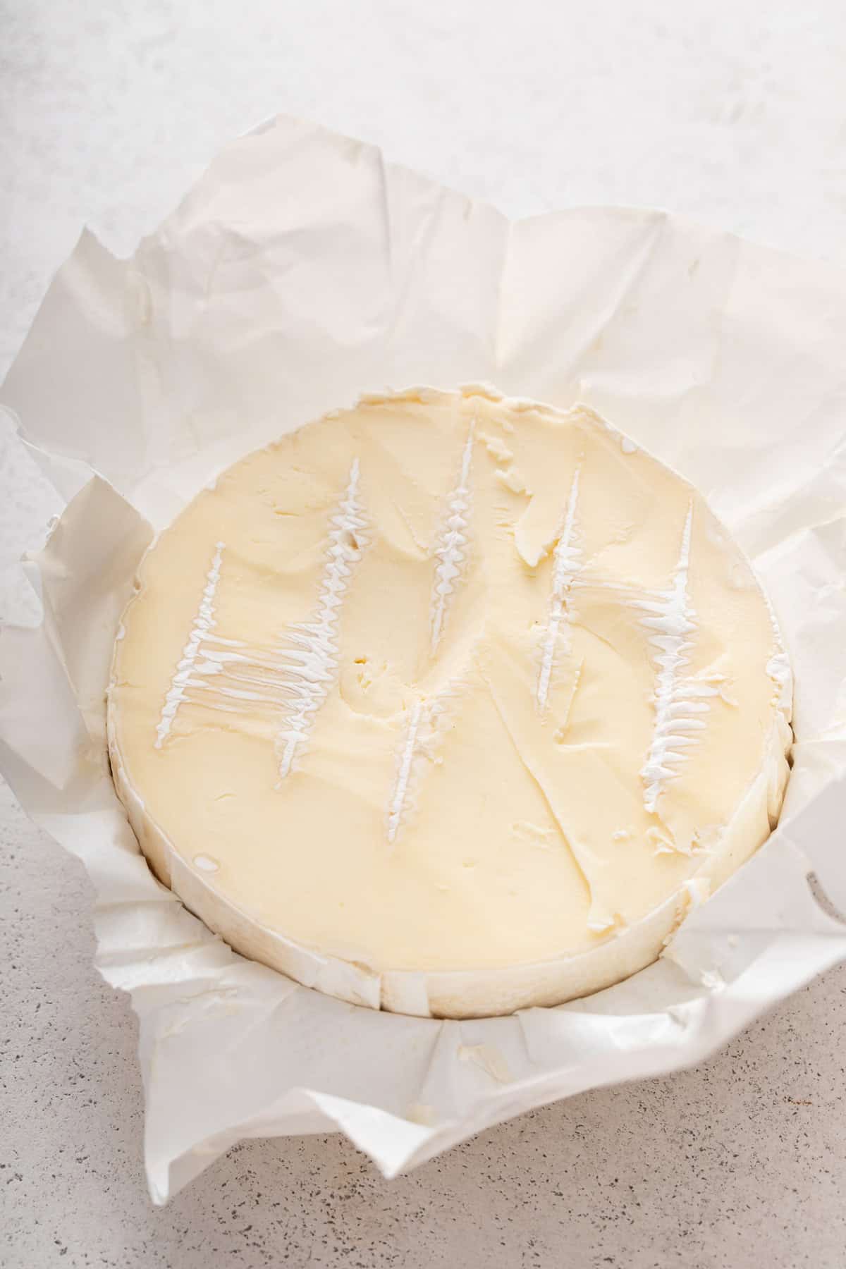 Top rind cut off of a wheel of brie.