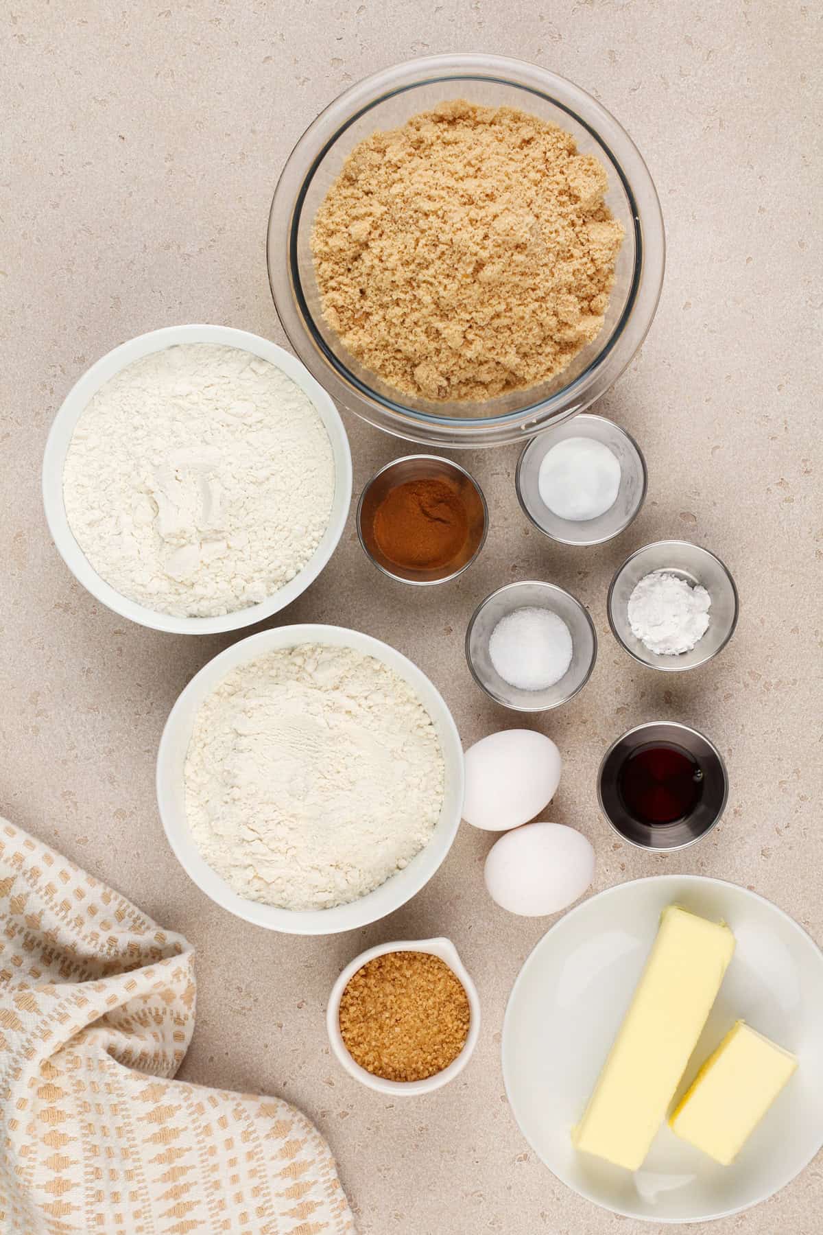 Ingredients for brown sugar cookies arranged on a countertop.