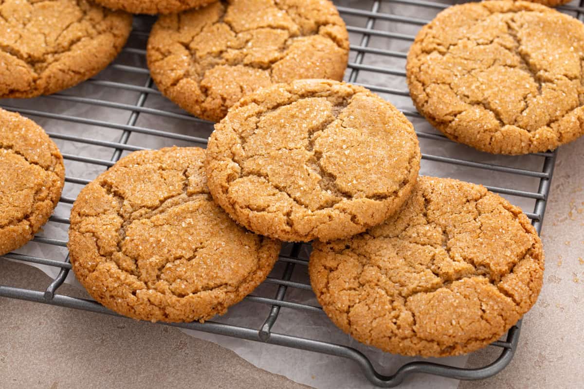 Close-up of brown sugar cookies resting on a cooling rack.