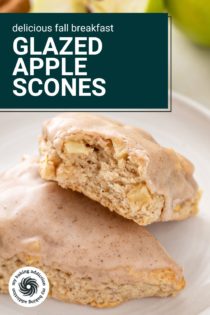 Close up of two apple scones on a plate, with a bite taken from one of them. Text overlay includes recipe name.