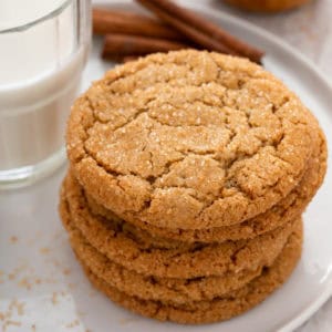 Stack of brown sugar cinnamon cookies on a white plate.