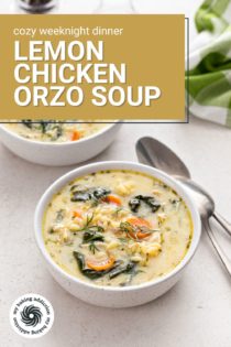 Two bowls filled with lemon chicken orzo soup next to spoons on a countertop. Text overlay includes recipe name.