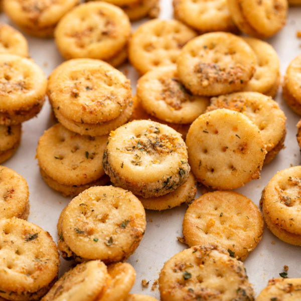 Close up of ranch crackers on a baking sheet.