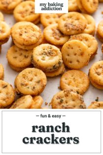 Close up photo of freshly baked ranch crackers on a piece of parchment paper. Text overlay includes recipe name.