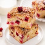 Two stacked slices of cranberry cake.