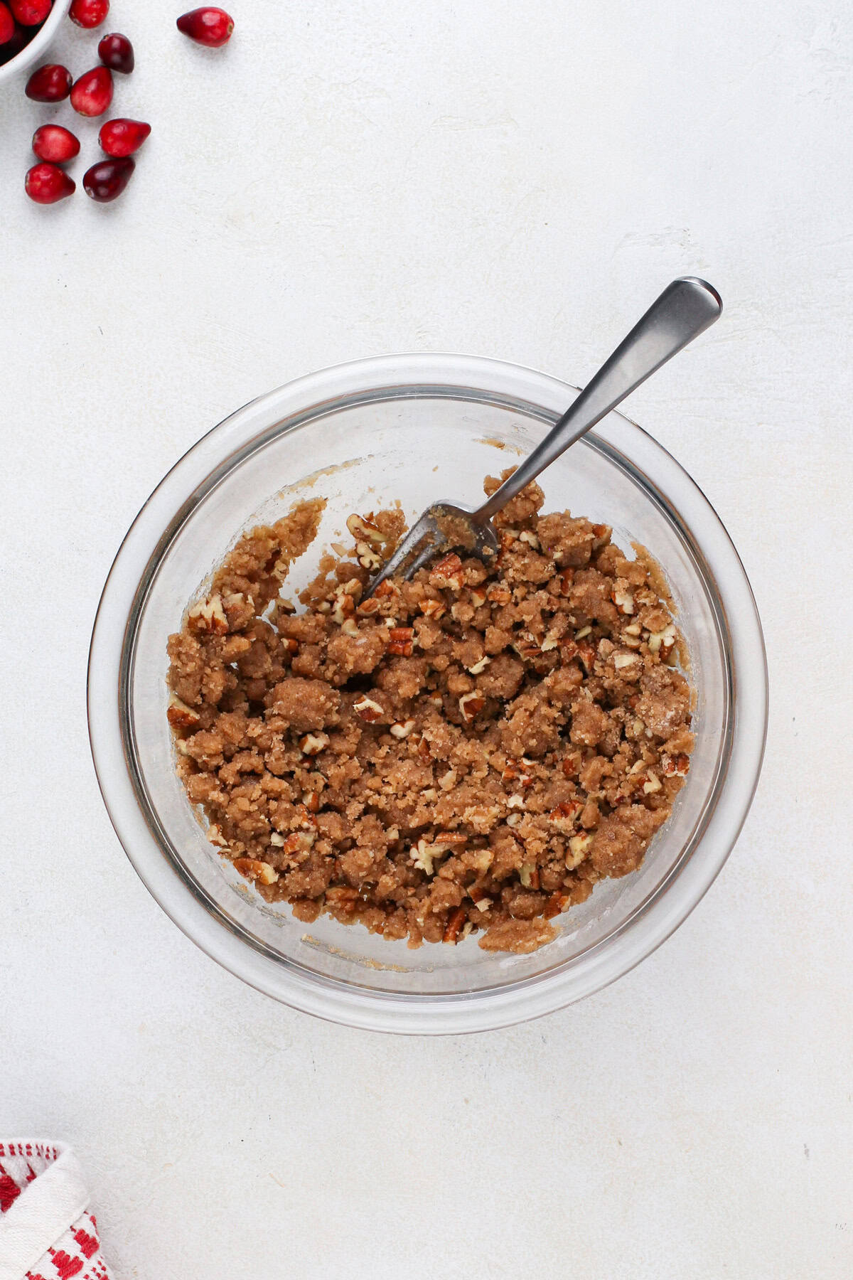 Streusel topping mixed together in a glass bowl.