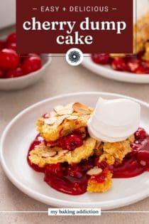 Serving of cherry dump cake on a white plate topped with whipped cream. Text overlay includes recipe name.