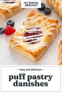 Close up of a puff pastry danish on a white countertop next to mixed berries. Text overlay includes recipe name.