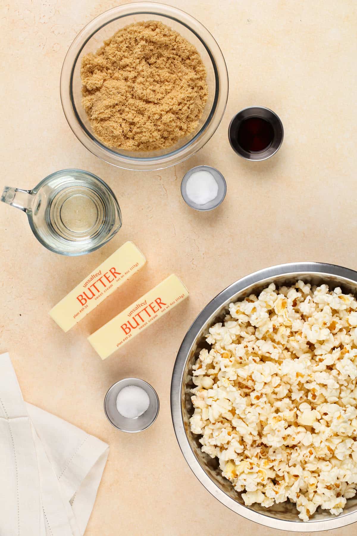 Ingredients for caramel corn arranged on a countertop.