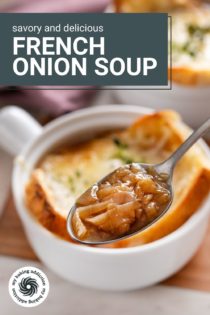 Spoon holding up a bite of french onion soup, with a bowl in the background. Text overlay includes recipe name.